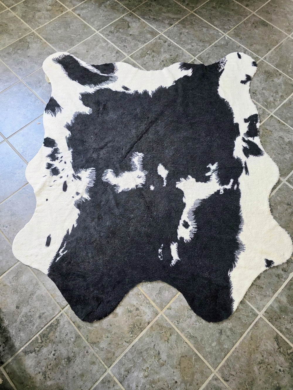 Black & White Cowhide Accent Rug - Home Accents